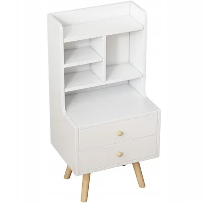 A white bedside table with two drawers and open shelves, standing on wooden legs.