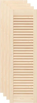 Four unpainted wooden louvered cabinet doors are stacked and leaning against each other.
