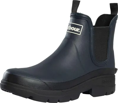A single navy blue Barbour boot is shown against a white background.