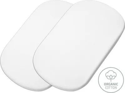 Two white fitted sheets for a crib or bassinet, angled on a white background.