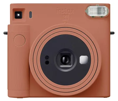 A front-facing studio shot of a Fujifilm instax SQUARE SQ 1 camera in terracotta orange.
