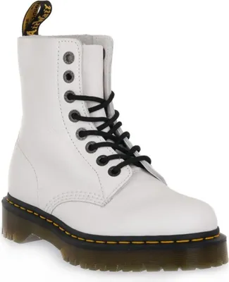 A single white Dr. Martens boot is shown against a white background.