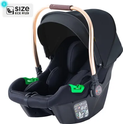 A black baby car seat with gold accents and green safety clips, shown from a slightly elevated front-left angle against a white background.