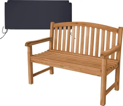 A wooden garden bench with a dark cushion placed behind it.