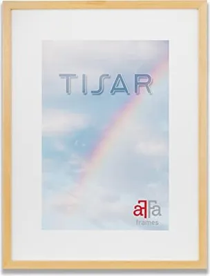 A framed picture with a rainbow and clouds.