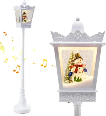 A white Christmas street lamp with a snowman inside, surrounded by musical notes.
