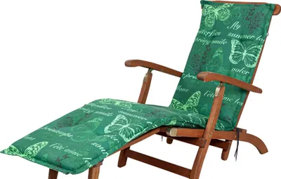 A green deckchair cushion with a butterfly pattern on a wooden deckchair.