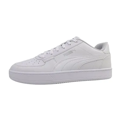 A white Puma sneaker is shown from the side against a white background.