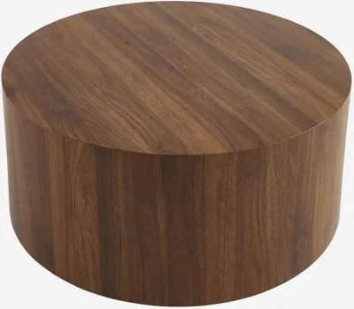 A round wooden coffee table with a walnut finish.