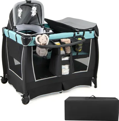 Produktbild von Baby Reisebett - 6‑in‑1 Bett & Wiege - Klappbar Tragbar - Matratze Inklusive - Wickelauflage - Verstellbares Verdeck & Musik - 1–2 Jahre - Grün