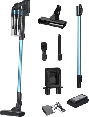 A collection of vacuum cleaner parts and accessories laid out on a white background.