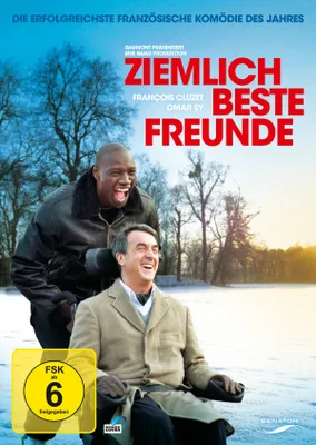 Two men, one in a wheelchair, are smiling and looking at each other in a snowy outdoor setting.