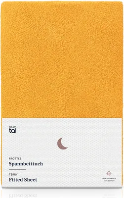 A flat lay of a yellow fitted sheet with a white label at the bottom.
