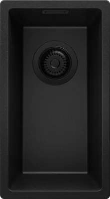 A top-down view of a black granite kitchen sink with a black drain assembly.
