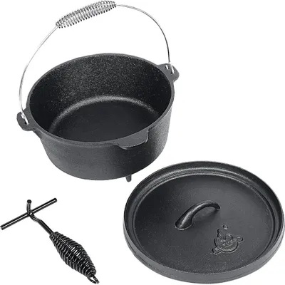 A cast iron Dutch oven with its lid and a lifting tool, displayed on a white background.