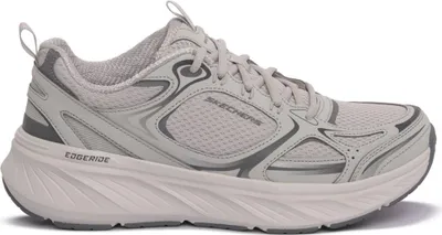 A side view of a gray Skechers Plateau sneaker against a white background.