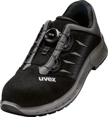 A single black and gray Uvex safety shoe is shown from a three-quarter side view against a white background.