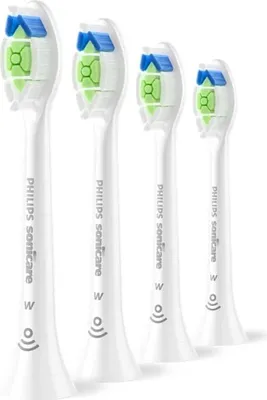 Four white Philips Sonicare toothbrush heads are arranged diagonally on a white background.