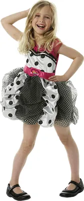 A young girl wearing a costume dress.
