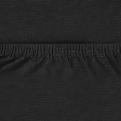 A close-up view of black fabric with an elasticated hem.