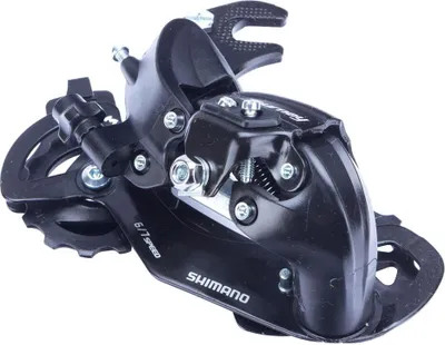 A black bicycle rear derailleur is shown against a white background.