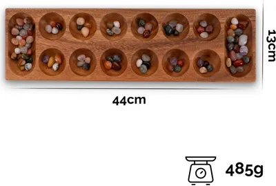 A wooden board game with colorful stones in its pits, along with dimensions and weight information.