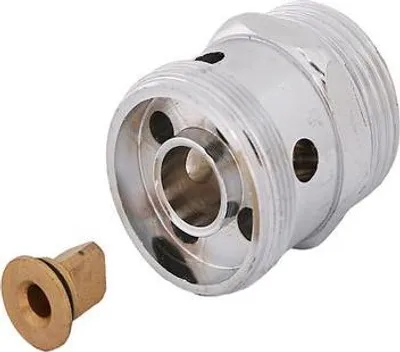 A polished chrome plumbing fitting and a brass component are shown against a white background.