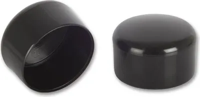 Two black caps are shown against a white background. One cap is on the left, viewed from an angle showing its open interior. The other cap is on the right, viewed from the top.