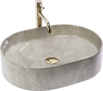 A grey oval basin with a gold drain and a gold faucet against a white background.