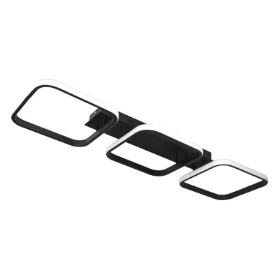 A modern black ceiling light with three square-shaped frames, each illuminated with white light, against a white background.