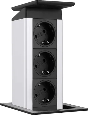 A pop-up power outlet with three sockets, designed to be installed in a surface.