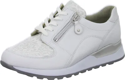 A white leather sneaker with a floral pattern on the toe box and a silver accent on the heel.