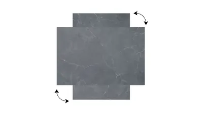 A dark gray marble-patterned magnetic board is shown from a top-down perspective, with two small extensions on opposite sides, and arrows indicating rotation.