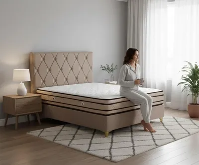Produktbild von Komfortables Doppelbett mit Kunstlederbezug und stabilem Rahmen