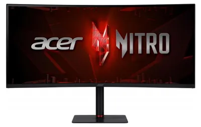 A computer monitor with the Acer Nitro logo displayed on the screen.