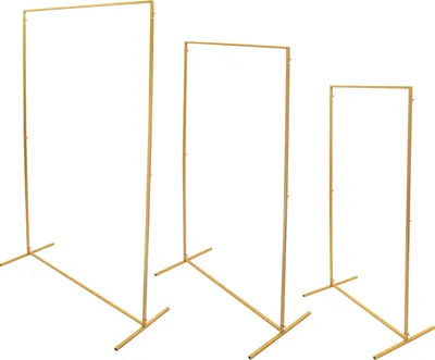 Three gold metal stands of varying heights are arranged on a white background.