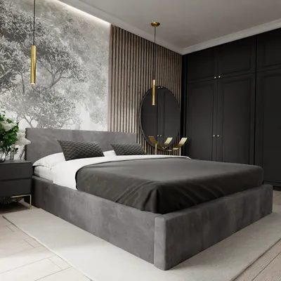 A modern bedroom with a large upholstered bed as the main focus.