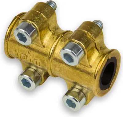 A close-up studio shot of a brass pipe fitting with hex bolts and a black rubber seal.