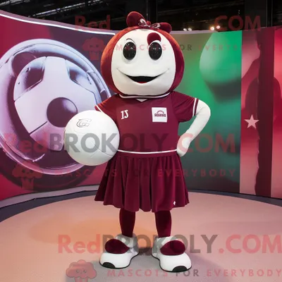 Productafbeelding van Mascottekarakter REDBROKOLY van een kastanjebruine handbalbal gekleed met een minirok en voetzolen