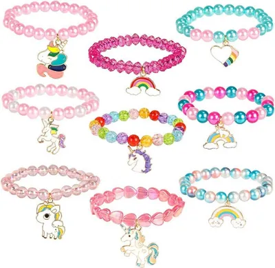 A collection of colorful beaded bracelets with unicorn and rainbow charms.