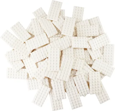 A pile of white LEGO baseplates.