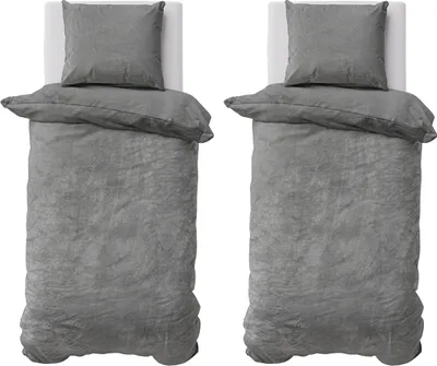 Two identical beds with bedding are shown from a top-down view.
