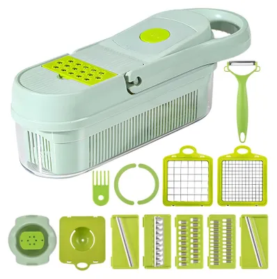 A multi-functional vegetable cutter with various attachments is displayed against a white background.