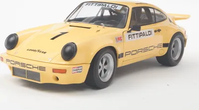 Image de Solido Modèle réduit de voiture échelle 1:18 Porsche 911 IROC #1 jaune 1974 S1810703