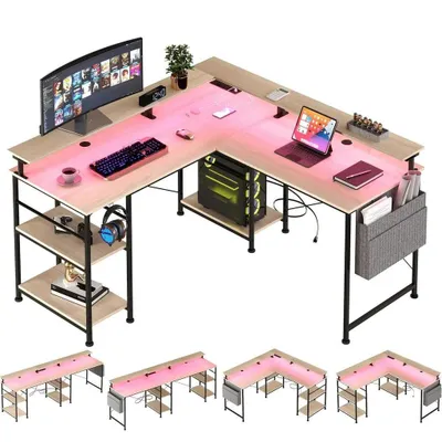 An L-shaped desk with a computer setup and accessories, shown from a slightly elevated angle.