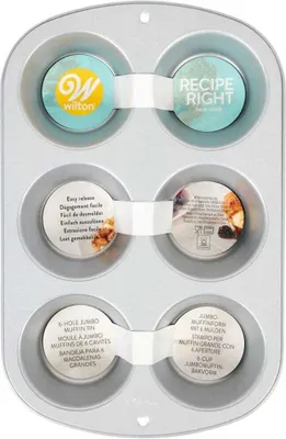 A top-down view of a silver muffin tin with product information labels attached.