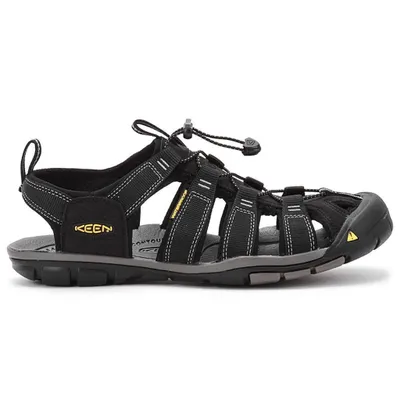 A side view of a black KEEN sandal against a white background.