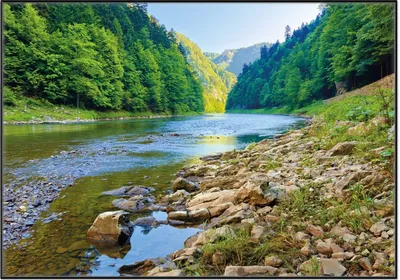 Produktbild von Wallario Wandbild Fluss in den Bergen an steinigem Ufer, Größe: 70,30 x 100,30 cm, Poster mit schwarzem Aluminiumrahmen