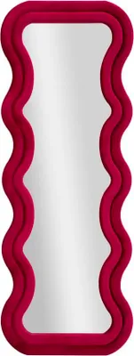 A full-length mirror with a wavy pink frame against a white background.