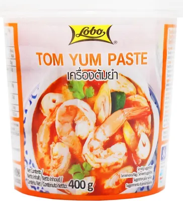 A container of Tom Yum paste with an image of the soup on the front.